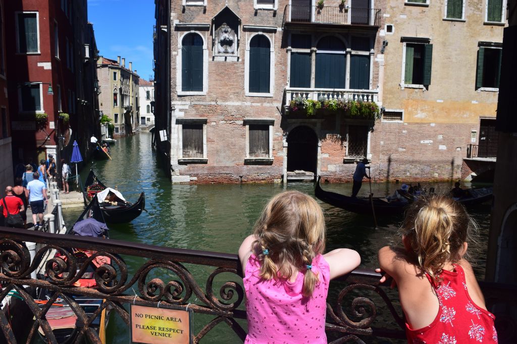 Toddlers watching Gondolas in Venice