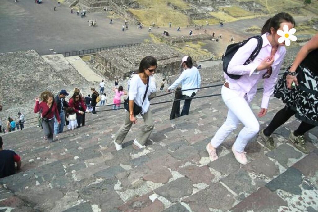 climbing the stairs to teotihuacan