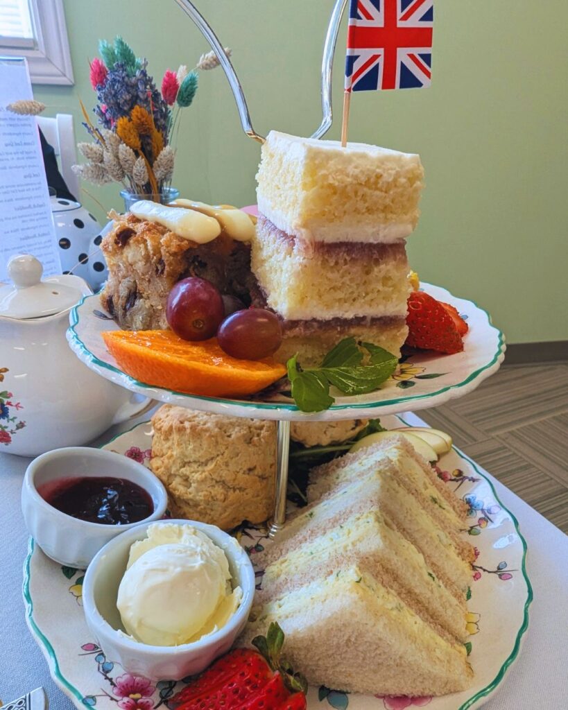 A high tea platter with baked goods, scones, fruit, jam and clotted cream at the Lady Sadie Tea Room in Alliston, Ontario