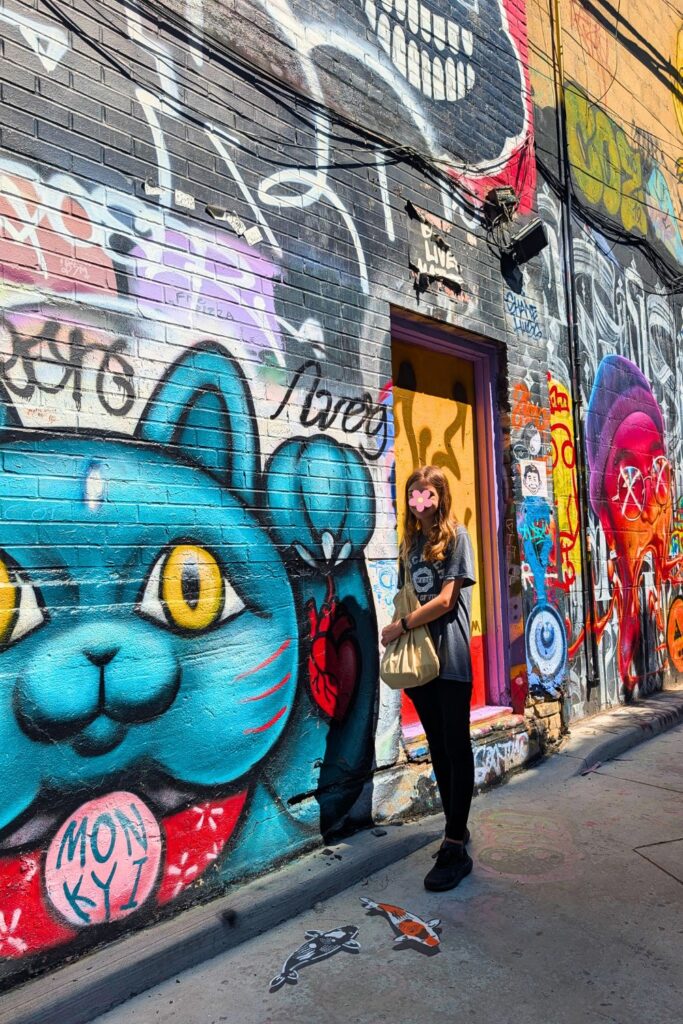 A girl in Graffiti Alley in Toronto