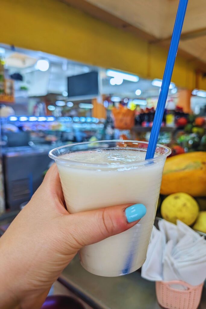 a cup of fresh guanabana juice at the market in Quito