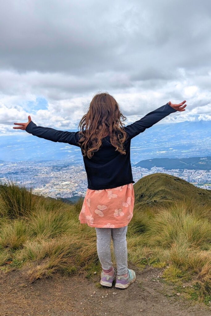 Young child at the top of Pinchincha volcano in Quito
