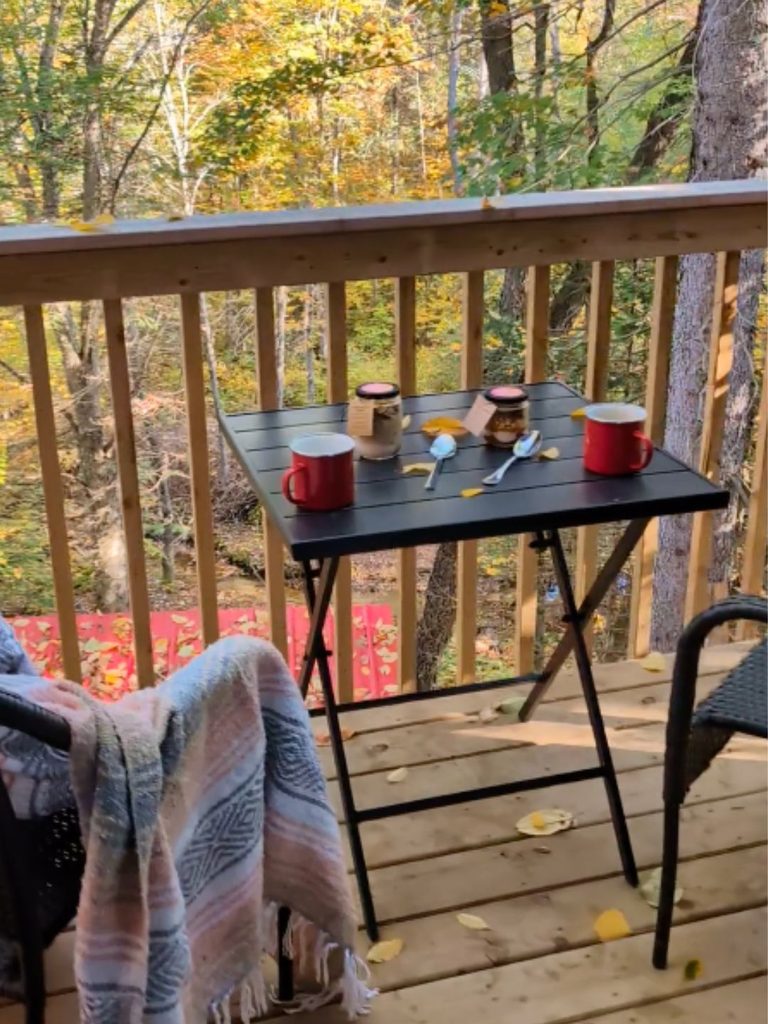 our morning coffee on the porch of Haus in the Trees